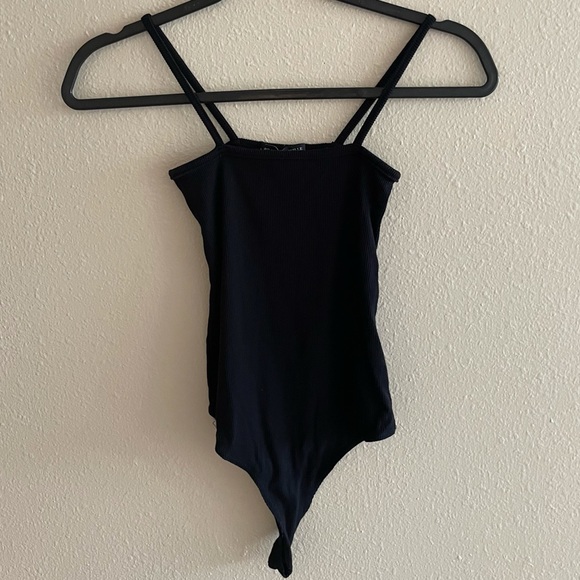 Brandy Melville Tops - Brandy Melville Black Ribbed Anna Bodysuit O/S